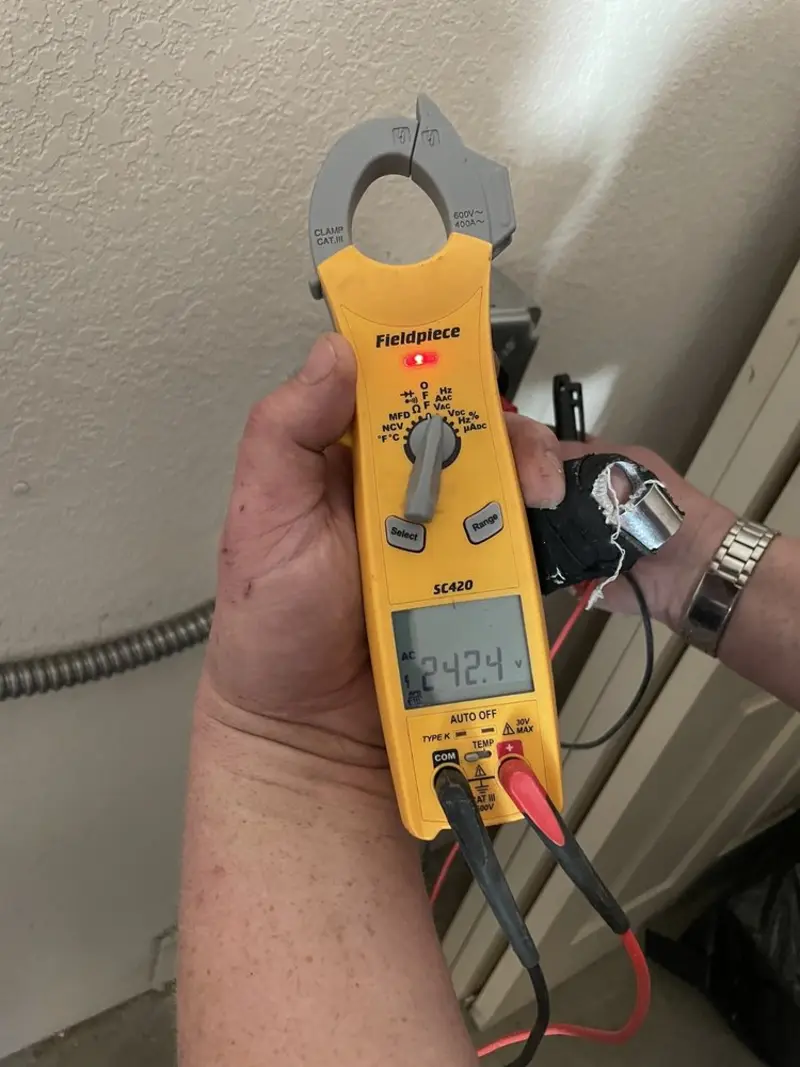 Voltage testing with clamp meter during Generator Installation in Sioux City